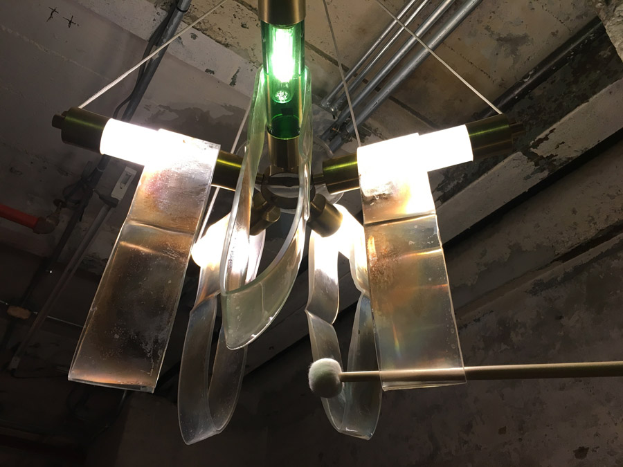 *Go Easy With Me II*, borosilicate, melted mirror and computer screen, electrical fixtures and mallet, approx 4'x2', "In Practice: Material Deviance", SculptureCenter, New York, 2017

Photo: Kyle Knodell