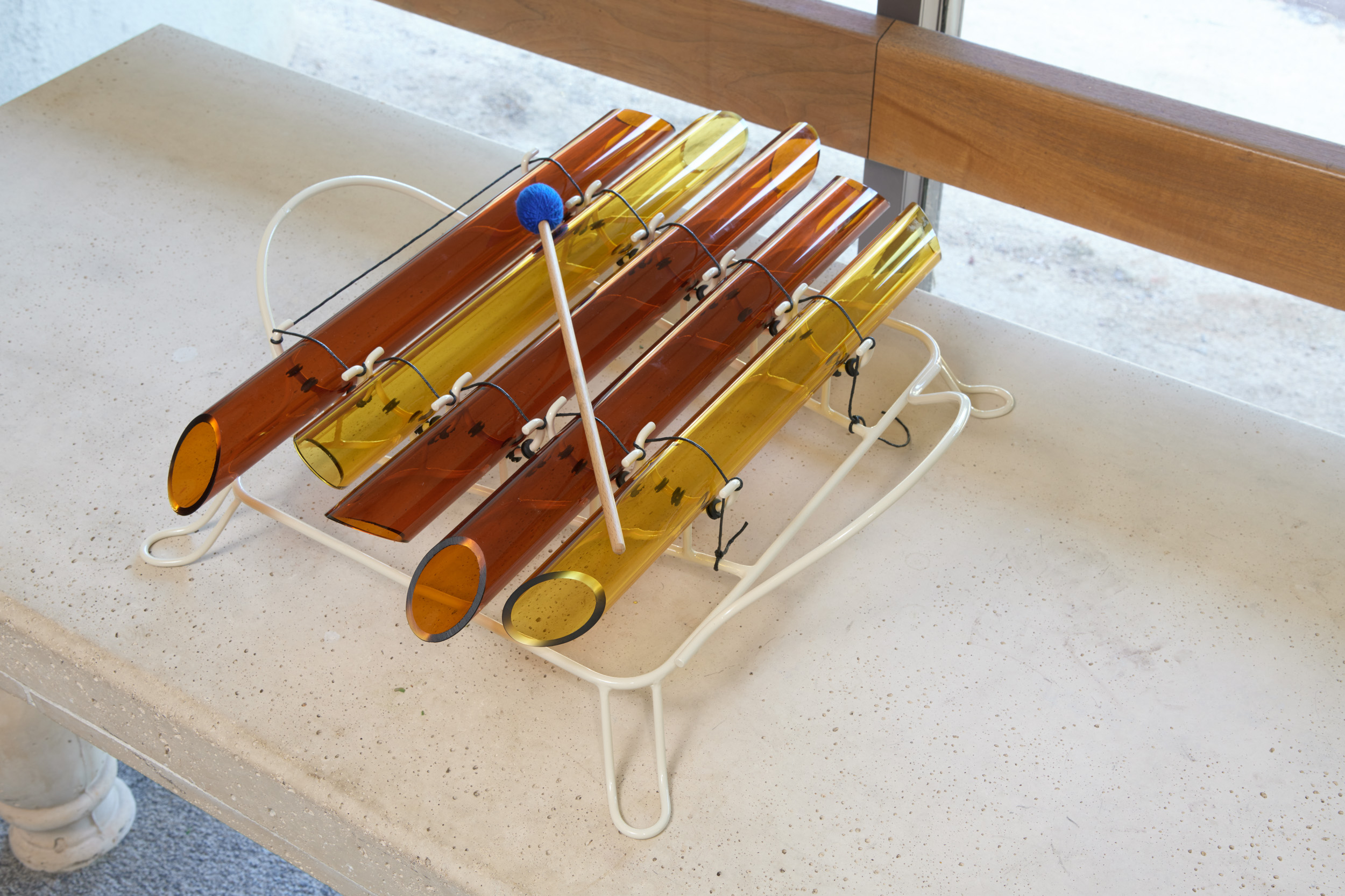 Glass Vibraphone IV, 2021-2022; Borosilicate tubes, metal armature (fabricated by Charles Mathis), mallet; 21x28x7 inches. Photography by Brica Wilcox.