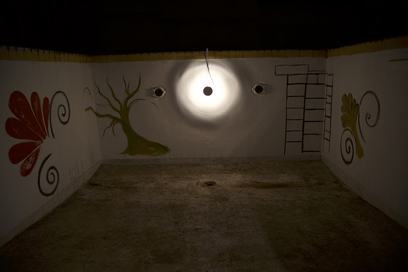 The Diver, 2018, milk paint, glass (rondels), borosilicate, wood, concrete, dirt, light fixture, TARP, Altadena, CA