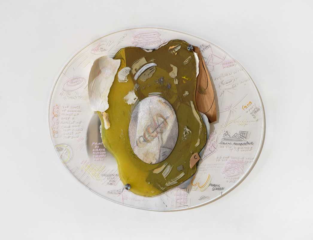 *G﻿lass Canon (Doodle Piece)*, 2025; plastic, mirror, marker, burnt mirror, paint, chalk, pencil, metal; 30x36x4 inches. 

Photograph by Brica Wilcox. Framing thanks to Paradise Framing, LA.